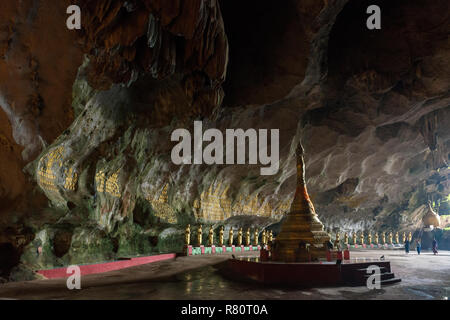 HPA-AN, MYANMAR - 19 NOVEMBER, 2018: Wide angle picture of  the interior of Sadan Cave with big pagoda, important landmark of Hpa-An, Myanmar Stock Photo