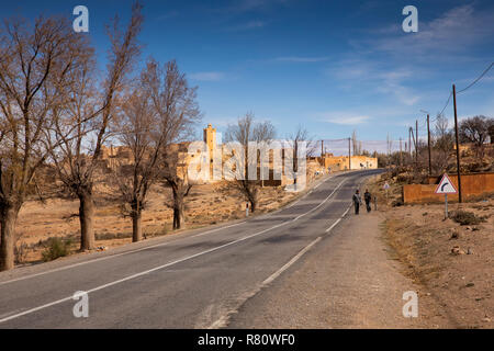 Morocco, Midelt, small traditional village mosque beside highway though Atlas Mountains Stock Photo