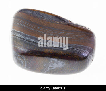 macro photography of natural mineral from geological collection - polished jaspillite (taconite jasper,ferruginous quartzite) gem stone on white backg Stock Photo