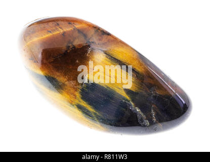 macro photography of natural mineral from geological collection - polished tiger's eye and hawk's eye gem stone on white background Stock Photo