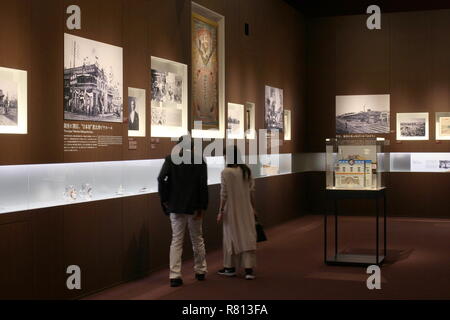 Visitors look at displays in the Yebisu Museum of Beer in Ebisu . It is operated by Sapporo Holdings. Stock Photo