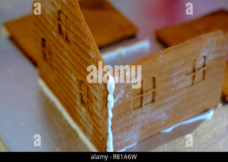 Step-by-step photos of the construction of a gingerbread house Stock Photo