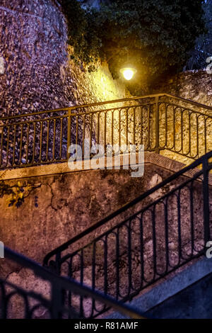 Nightshot of stairs leading from the old village vielle ville up the castle hill colline du chateau in Nice France Stock Photo