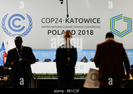 Delegates are seen walking during the second part of the high-level segment at the COP24 UN Climate Change Conference 2018 Stock Photo