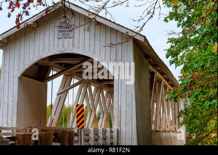 Scio, Oregon, USA - October 6,2015:  The Gilkey Covered Bridge, built in 1939 and reconditioned in 1998 and crosses Thomas Creek in rural Linn County  Stock Photo