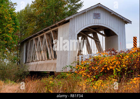 Scio, Oregon, USA - October 6,2015:  The Gilkey Covered Bridge, built in 1939 and reconditioned in 1998 and crosses Thomas Creek in rural Linn County  Stock Photo