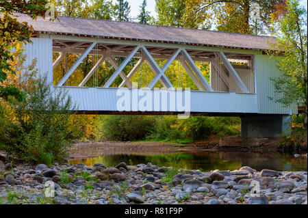 Scio, Oregon, USA - October 6,2015:Larwood covered bridge crosses Crabtree Creek in rural Oregon.  Built in 1939 it is an repaired in 2002. Stock Photo