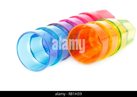 Colorful plastic glasses isolated on white background. Stock Photo