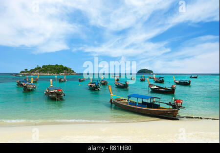 Many long-tailed boat on Sunrise Beach, Koh LIPE, Thailand. Stock Photo