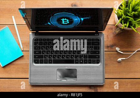 laptop computer with bitcoin symbol on screen Stock Photo