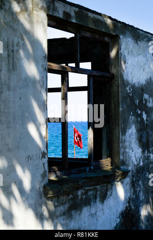 Waving Turkey flag framed on an old window Stock Photo