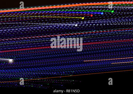 Abstract multi color line background against black background. Stock Photo
