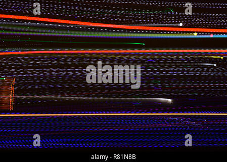Abstract multi color line background against black background. Stock Photo