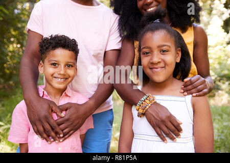 Mid section of black couple and their two children, portrait Stock Photo