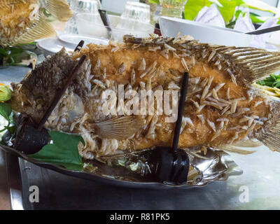 Deep Fried Elephant's Ear Fish Ca Tai Tuong Chien Xu main part of tourists meal in Mr Kiet's Historic House Cai Be Vietnam Asia Stock Photo