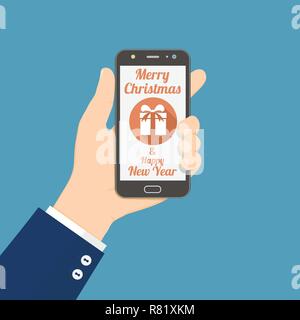 Hand holding smartphone with Christmas gift icon on screen Stock Vector