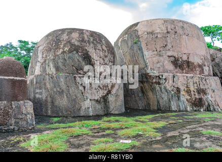 Big rock semi circle cut close view at top of hills. Stock Photo