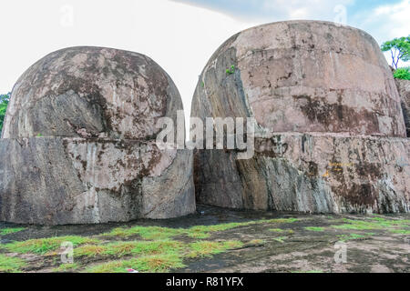 Big rock semi circle cut close view at top of hills. Stock Photo