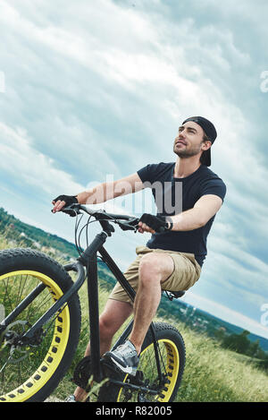 A Man Riding a Bicycle · Free Stock Photo