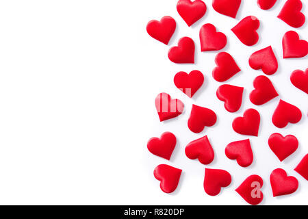 Red hearts pattern isolated on white background. Top view. Copyspace Stock Photo