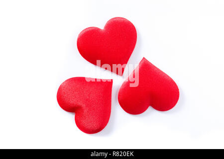 Red hearts pattern isolated on white background. Top view. Stock Photo
