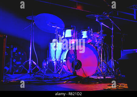 drum set on a stage in blue light Stock Photo