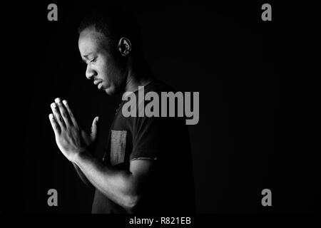 Premium Photo  Sad young african man profile view thinking in black and  white