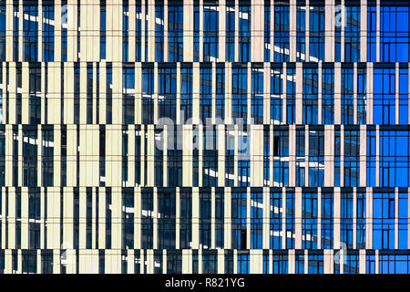 Windows of skyscraper, architecture close up. Glass and concrete. Urban Business District. Modern abstract background, glass facades, tall buildings Stock Photo