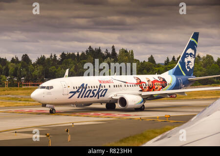 SEATTLE, WA, USA - JUNE 2019: Alaska Airlines Boeing 737 taxiing for take off. The aircraft carries an 'Incredibles 2' paint scheme