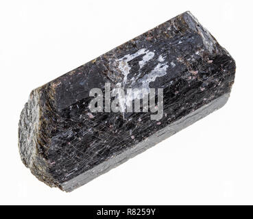 macro photography of natural mineral from geological collection - rough dravite tourmaline stone on white background Stock Photo