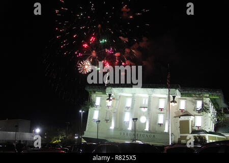 Fireworks show seen over WonderWorks upside down building in Pigeon Forge, TN, USA Stock Photo