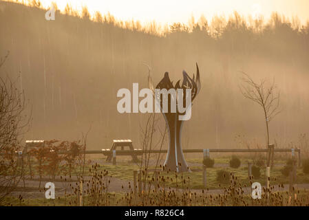 Mining Memorial Flame on a misty morning at Gedling Country Park in Nottingham, Nottinghamshire England UK Stock Photo