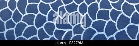 White pattern on a blue wall Stock Photo