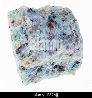 macro photography of natural mineral from geological collection - rough amazonite granite stone on white background Stock Photo