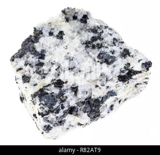 macro photography of natural mineral from geological collection - rough white granite stone on white background Stock Photo