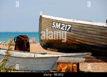Old fishing boat, SM217, on beach at Brighton, East Sussex, England Stock Photo