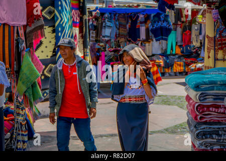 OTAVALO, ECUADOR, NOVEMBER 06, 2018: Outdoor view of hispanic indigenous people in a street market in Otavalo Stock Photo