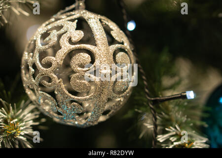 Spruce branches, fir cones and Christmas decorations. Christmas still life. Christmas decorations on music sheets, closeup. Stock Photo