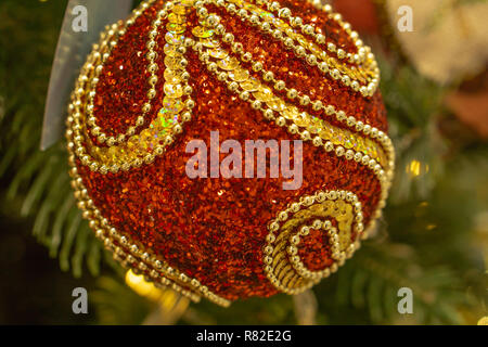 Spruce branches, fir cones and Christmas decorations. Christmas still life. Christmas decorations on music sheets, closeup. Stock Photo