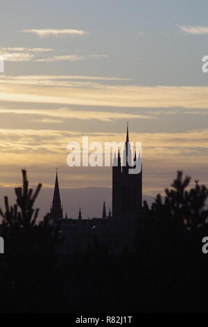 Silhouette of the Gothic Mitchell Tower, Marischal College and the Aberdeen Skyline at Sunset. Aberdeen, Scotland, UK Stock Photo