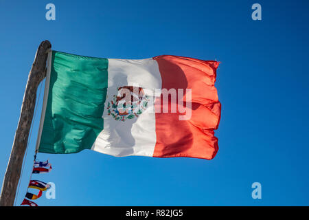 mexican flag in the blue sky Stock Photo