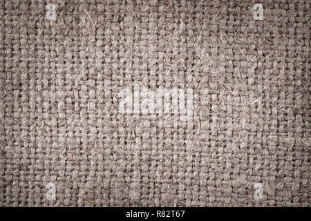 Rough canvas close up. Large macro texture and background with light center Stock Photo