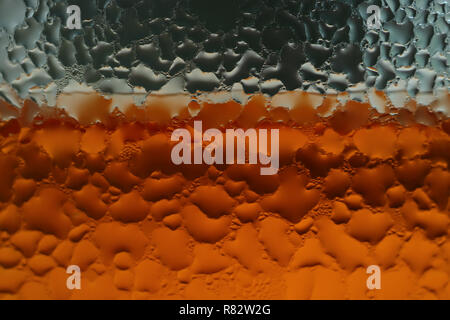 Water droplets of condensation on the transparent glass of soft drink Stock Photo