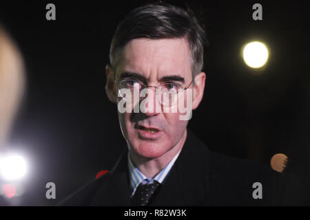 Conservative MP Jacob Rees-Mogg outside the Houses of Parliament in Westminster, London, after Prime Minister Theresa May survived an attempt by Tory MPs to oust her with a vote of no confidence. Stock Photo