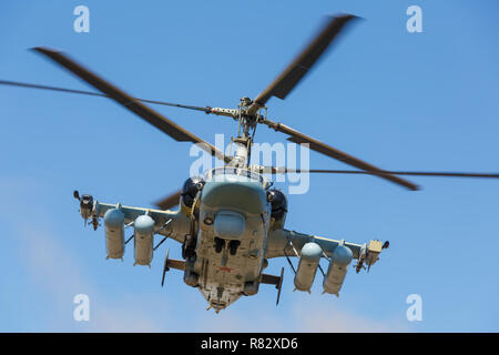 Attack helicopter Ka-52 Alligator, named the flying tank. Forward view, in flight Stock Photo
