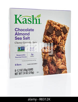 Winneconne, WI - 10 December 2018: A package of Kashi chocolate almond sea salt chewy granola bar on an isolated background. Stock Photo