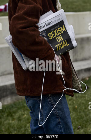 Columbus, Ohio, USA. 12th Dec, 2018. A protester seen holding a hanger during the demonstration.Protesters marched to the Ohio State House in Columbus, Ohio to protest the controversial Heartbeat Bill or HB258, which bans abortion once a fetal heartbeat is detected. The bill would make it much more difficult for women to seek an abortion in the state of Ohio. The bill was passed by members of the Ohio Senate with a vote of 18-13. Credit: ZUMA Press, Inc./Alamy Live News Stock Photo