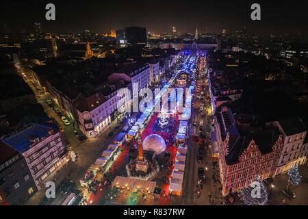 Brussels, Belgium. 12th Dec, 2018. A Christmas market is seen in central Brussels, Belgium, on Dec. 12, 2018. More than 200 chalets and fairground attractions at the Christmas market attract visitors here in the holiday season. Credit: Zheng Huansong/Xinhua/Alamy Live News Stock Photo
