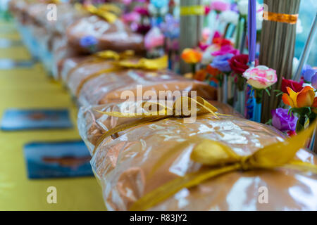 new monk's robes on a tray at the religious ceremony in temple Stock Photo