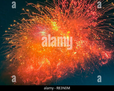 Long Exposure of Fireworks Against a Black Sky. Panorama of beautiful colorful holiday fireworks Stock Photo